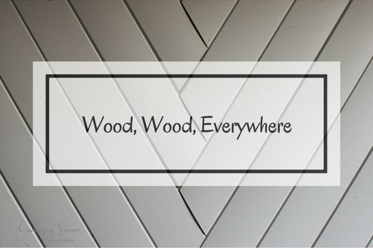 A diagonal wood pattern background with a white rectangular overlay containing the text "Wood, Wood, Everywhere" in the center.