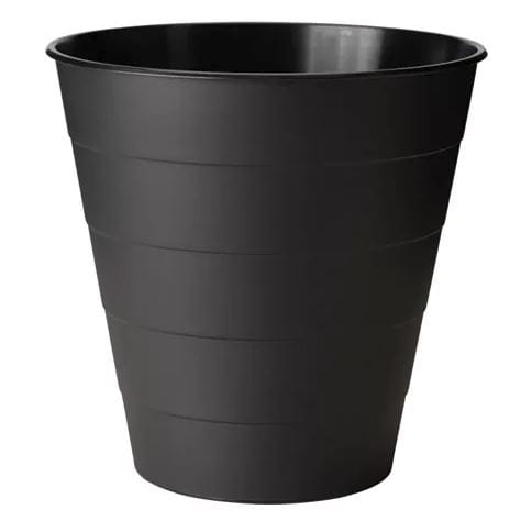A black, cylindrical plastic wastebasket with a slightly tapered shape and horizontal grooves embodies modern style. Reminiscent of the Ikea Fniss collection, its smooth matte interior and exterior stand out, empty against a plain white background.