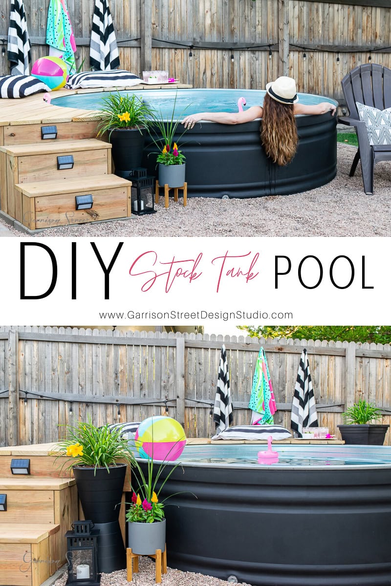A backyard oasis with a woman in a straw hat relaxing in a stock tank pool, surrounded by vibrant towels, a beach ball, and lush potted plants. The wooden deck and fence complete this inviting DIY stock tank pool setup.