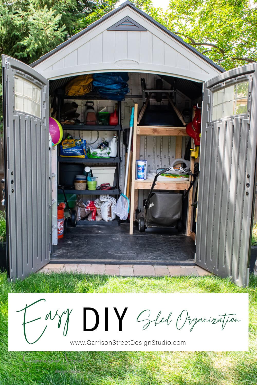 A well-organized shed with open double doors showcases neatly arranged gardening tools, DIY projects, and storage bins. The grass in front is tidy, while trees provide shade. Text on the image reads "Easy DIY Shed Organization" with a website link below.