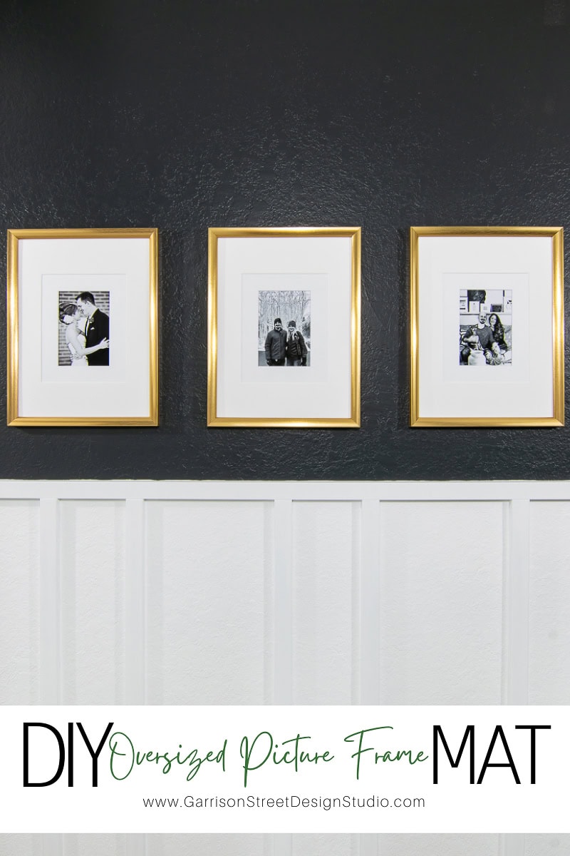 Three framed black-and-white photographs with gold borders hang on a dark green wall above white wainscoting. Text at the bottom reads "DIY Oversized Picture Frame Mat" with a website link below. Each picture frame exudes elegance and sophistication, enhancing your living space.