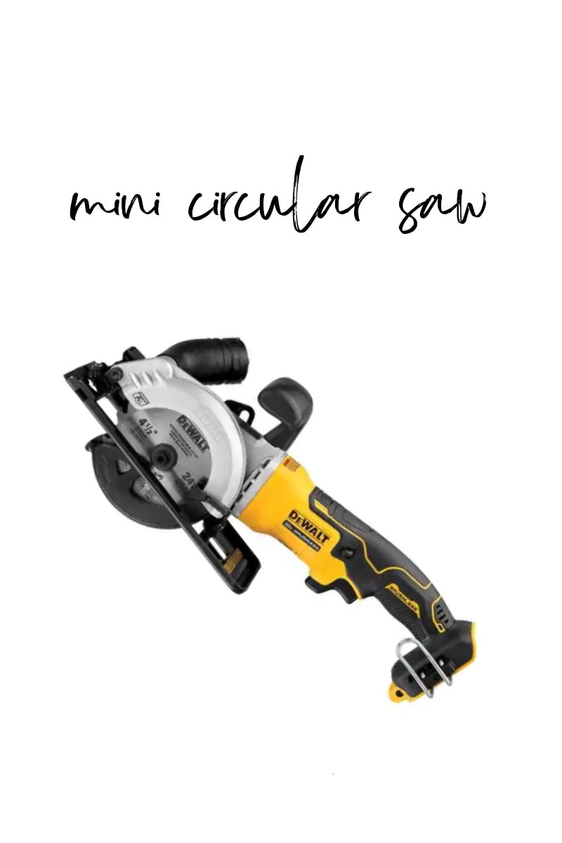 A yellow and black mini circular saw with a silver blade sits against a white background. Above the scene, the handwritten words "mini circular saw" stand out.