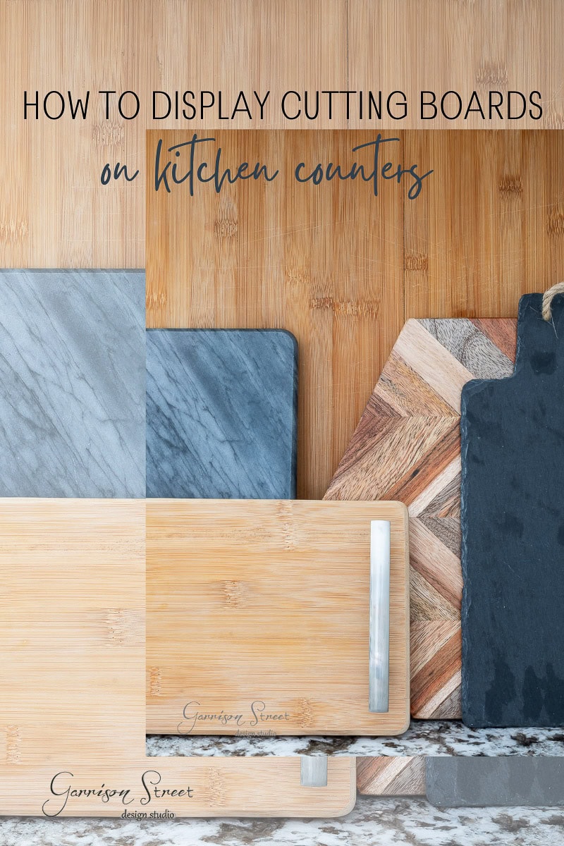 A collection of cutting boards on a kitchen counter, showcasing wood, marble, and slate materials. Discover inventive ways on "How to Display Cutting Boards on Kitchen Counters" for a stylish, functional setup.