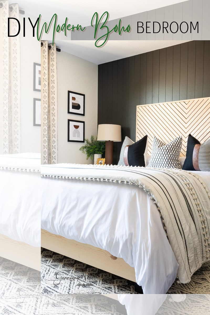 A stylish guest bedroom makeover features a white bed with patterned pillows and a textured headboard. The room showcases a modern boho design, with framed art and a lamp on the nightstand against a dark accent wall. Patterned curtains and a geometric rug complete the look.
