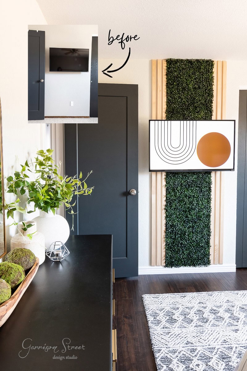 Modern interior design in a guest bedroom makeover, featuring a wall with geometric artwork and vertical greenery. A dark door contrasts with light walls. A black dresser is adorned with a plant and decor. An inset image reveals the same wall before styling, previously showing a TV mounted.