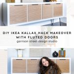 A woman sits on the floor smiling in front of a white IKEA Kallax with wood fluted cabinet doors, styled with plants and decor items on top. Text reads: "DIY IKEA KALLAX Hack Makeover with Fluted Doors - Garrison Street Design Studio.