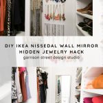 A closet features neatly organized clothes, shoes, and bags. A wall mirror conceals a hidden jewelry display with necklaces and earrings. The image includes the text "DIY IKEA NISSEDAL WALL MIRROR HIDDEN JEWELRY HACK" from Garrison Street Design Studio.