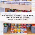 A well-organized kitchen pantry features labeled clear containers with various dry goods on upper shelves and categorized canned goods and items in gray baskets on lower shelves. The image promotes DIY pantry organization.