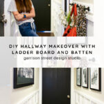 A woman stands in a stylish hallway with white board and batten walls, black doors, framed art, and hanging accessories. Text reads: “DIY Hallway Makeover with Ladder Board and Batten, Garrison Street Design Studio.”.