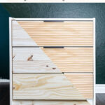 A split-image of an IKEA RAST dresser shows a DIY transformation: the left half is the plain original, and the right half features a fluted wood makeover. Text above reads, "DIY IKEA RAST FLUTED DRESSER HACK.