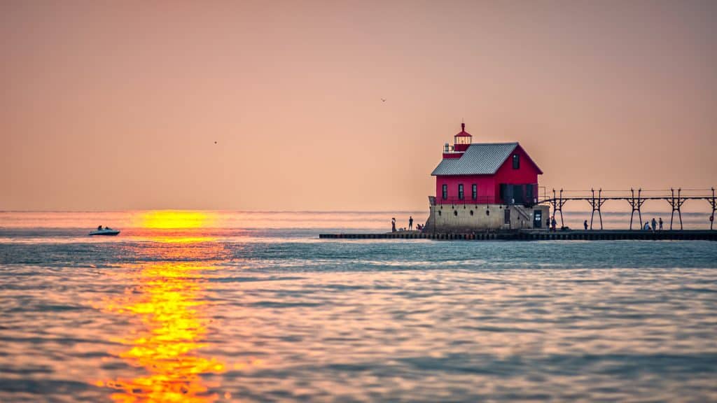 Sunset view at Service Area with ocean and pier, showcasing Grand Countertops' quality.