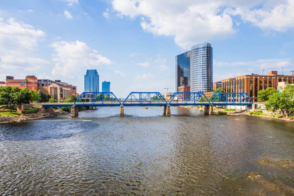Cityscape view of Service Area with modern buildings and riverfront.