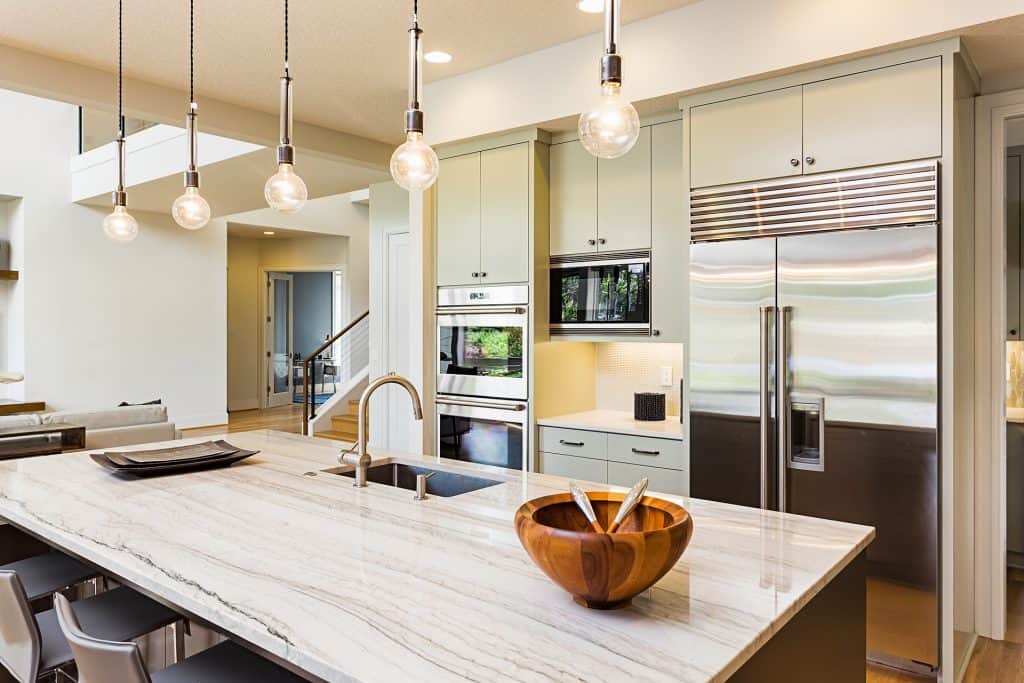 Granite countertops in a contemporary kitchen setting, showcasing durability and elegant design.