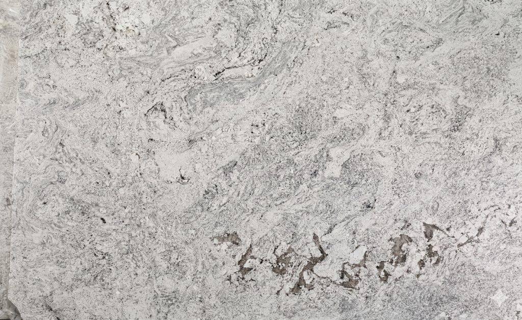 Quartz countertop in Juparana Bahama finish with natural stone appearance.