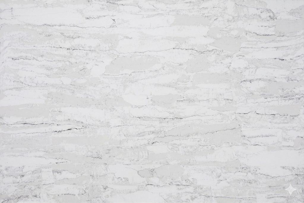 White marble countertop with luxurious veining for opulent kitchen designs.