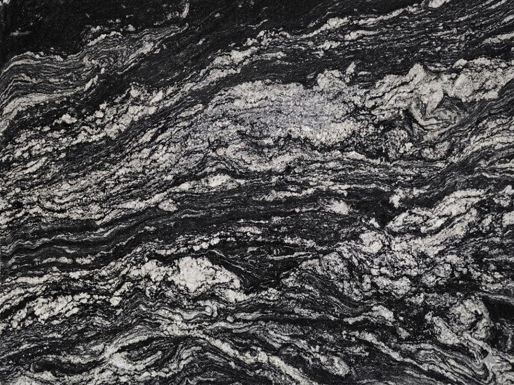 Dark granite with swirling black and gray patterns.