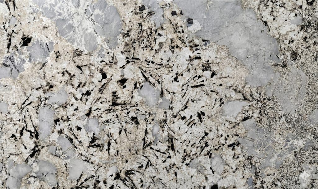 Patagonia Sky granite countertop with natural stone pattern and gray, black, and white tones.