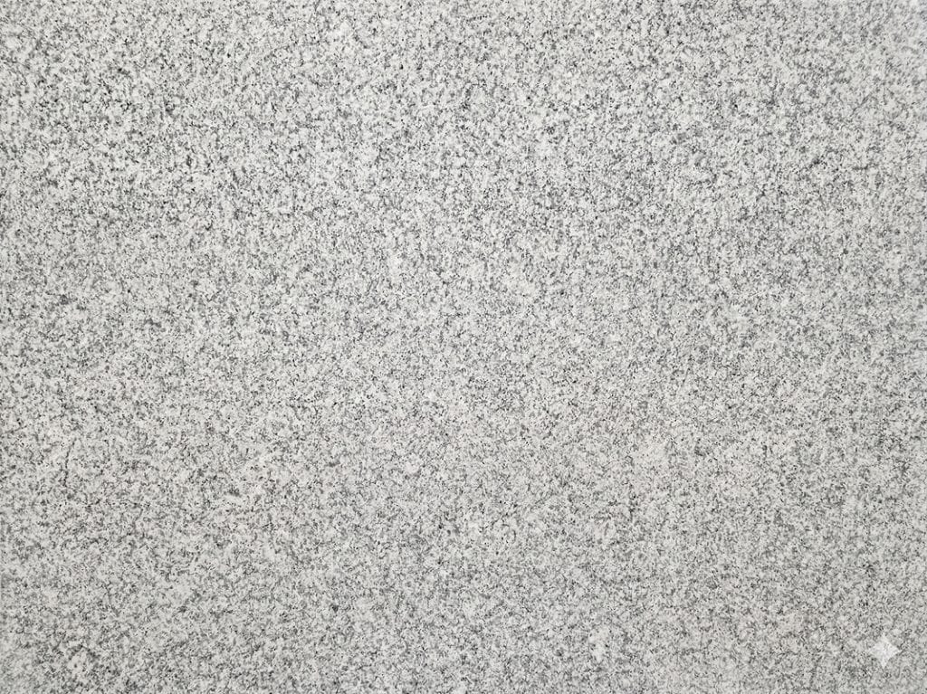 Granite countertop surface with a textured, speckled finish.