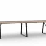 Long modern conference table with black metal legs at Grand River Office.