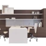 Contemporary office workspace with desk, chairs, and storage shelves.
