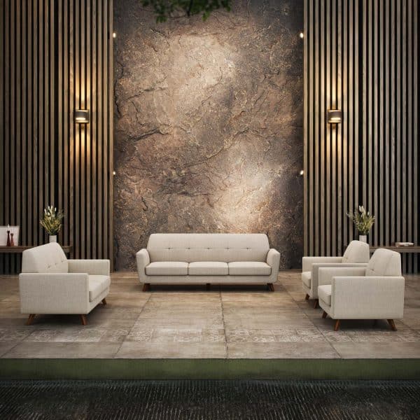 Contemporary office lobby with white sofas and decorative wall panels.