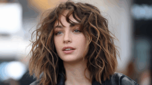 25 Fabulous Curly Hairstyles With Side Bangs For Natural Texture
