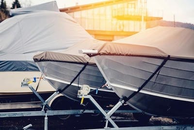 Aluminum boats at Hall's Sport Center, perfect for fishing and water adventures.
