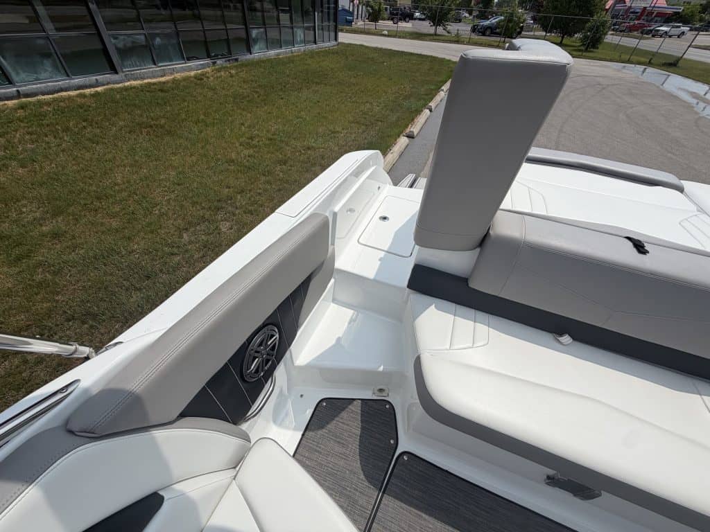Luxury white boat with seating area and modern design at Hall's Sport Center.