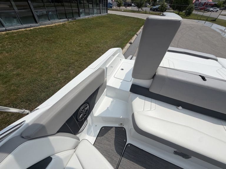 Luxury white boat with seating area and modern design at Hall's Sport Center.