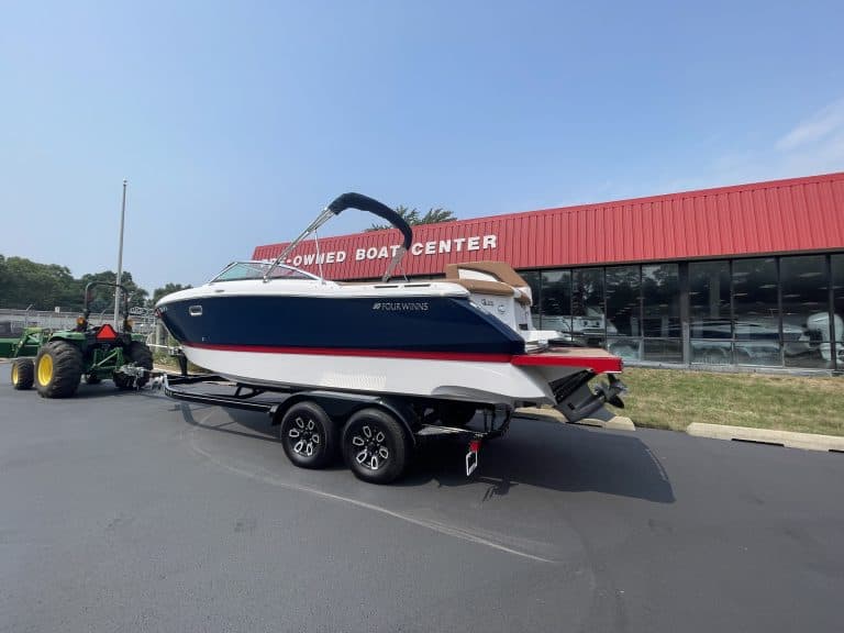 Four Winns H260 boat on trailer at Hall's Sport Center.