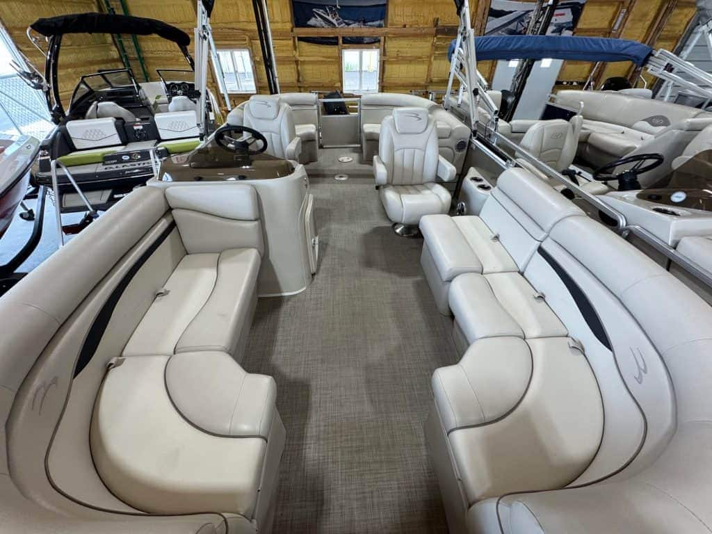 Pontoon boat with spacious seating and modern design.