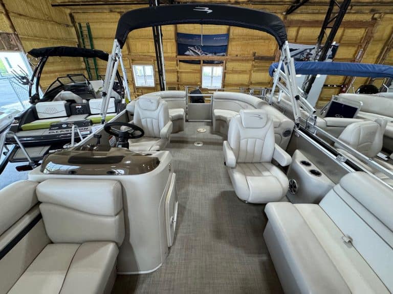 Modern Bennington 20 SXSR pontoon boat at Hall's Sport Center showroom.