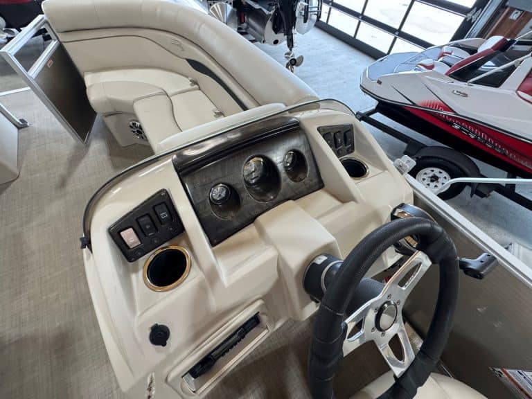 High-quality Bennington 20 SXSR pontoon boat dashboard and steering wheel.