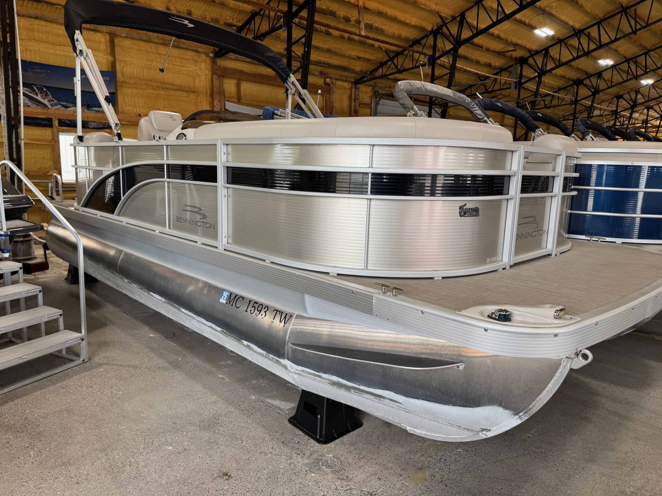 Bennington 20 SXSR pontoon boat at Hall's Sport Center showroom.
