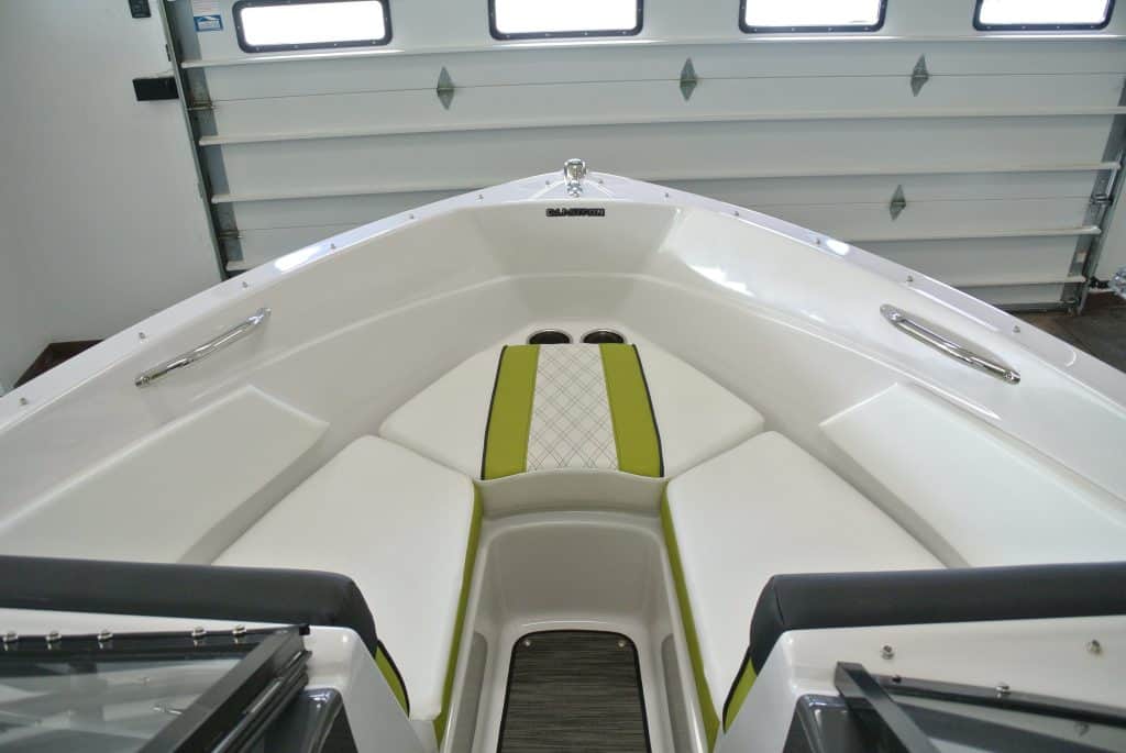 Versatile boat at Hall's Sport Center with sleek style and seating comfort.