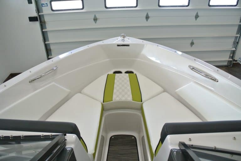 Versatile boat at Hall's Sport Center with sleek style and seating comfort.
