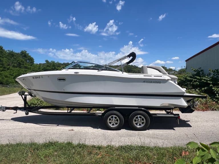 Four Winns H260 boat on trailer at Hall's Sport Center.
