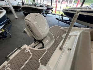 Marine boats and outboard motors on display, ideal for water sports and fishing adventures.