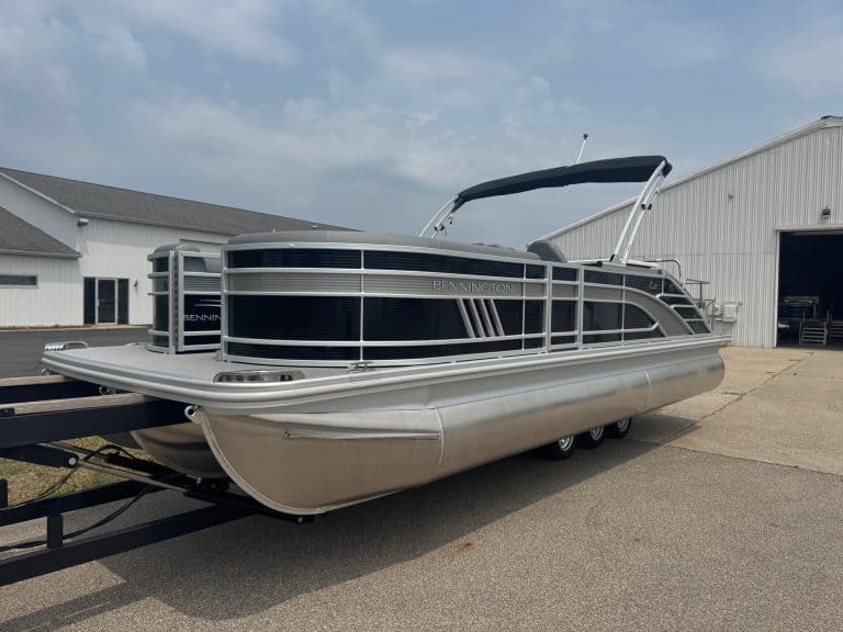 Luxury pontoon boat with Bennington branding, ideal for leisure cruises and water fun. Built for comfort and durability.