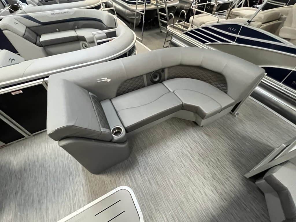 Comfortable, stylish pontoon boat seating with premium cushions and integrated speakers. Perfect for leisure on the water.