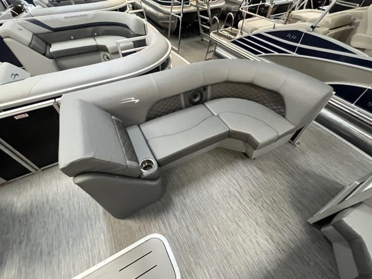Comfortable, stylish pontoon boat seating with premium cushions and integrated speakers. Perfect for leisure on the water.