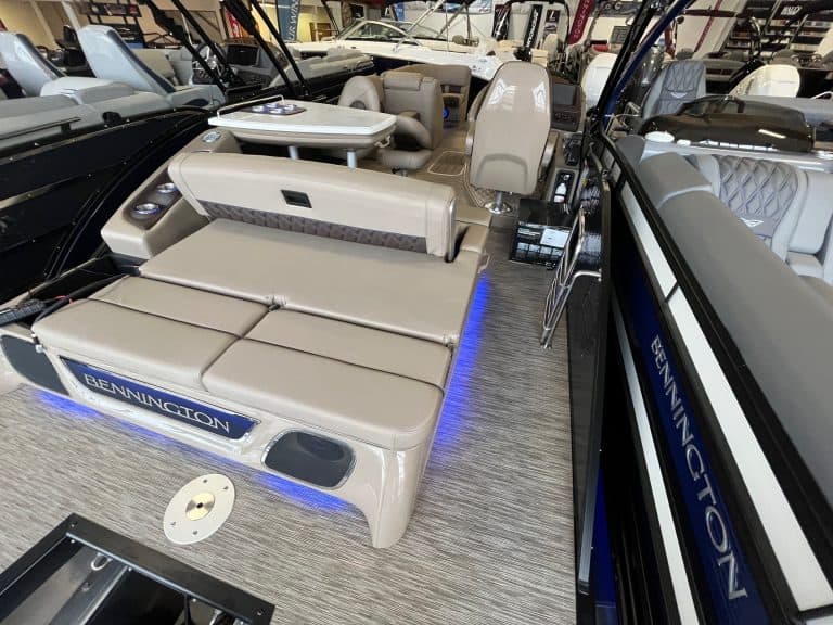 High-quality Bennington pontoon boat with comfortable seating, built for leisure and entertainment at Hall's Sport Center.