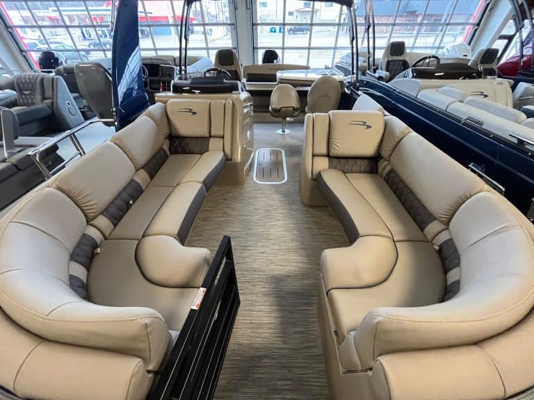 Comfortable beige and brown boat seating for sale at Hall's Sport Center. Perfect for recreational boats and yacht interiors.