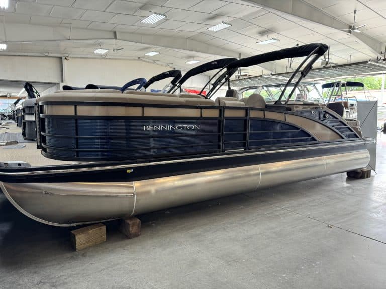 Pontoon boat with spacious deck and comfortable seating.