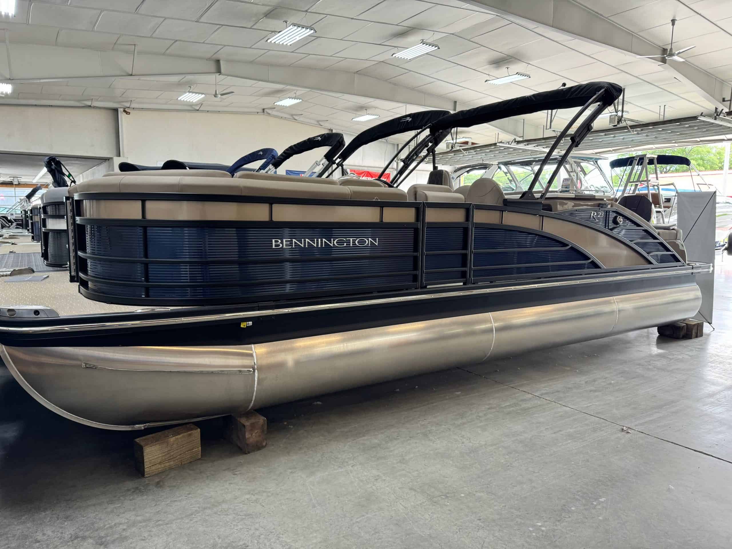 Pontoon boat with spacious deck and comfortable seating.