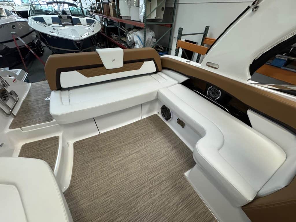 Luxury boat interior with spacious seating and modern design.