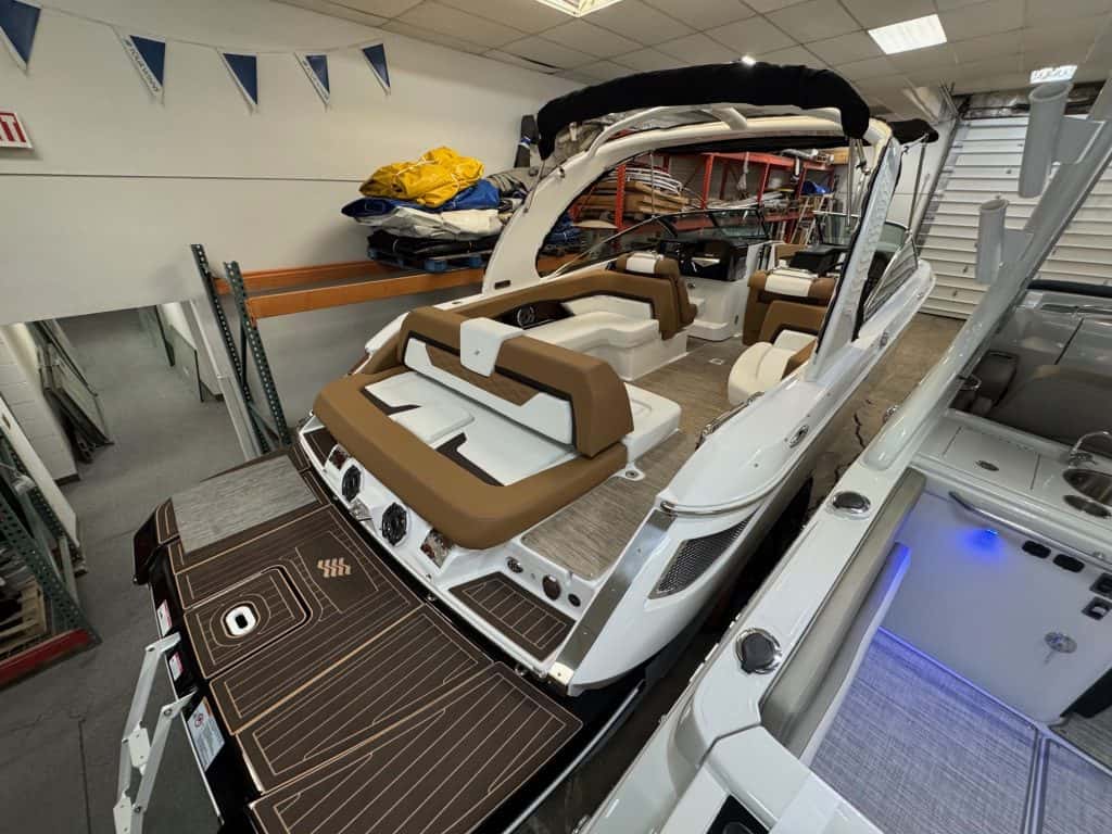 Luxury Four Winns H290 boat at Hall's Sport Center showroom.