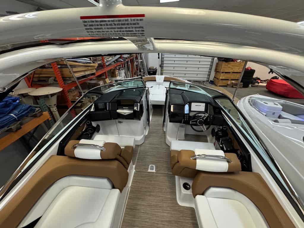 Luxury boat interior with spacious seating and modern controls.