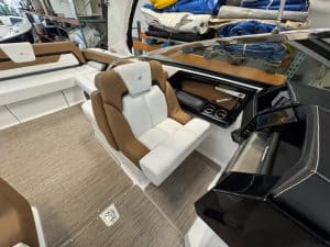 Luxury boat cockpit with comfortable seating and modern controls.