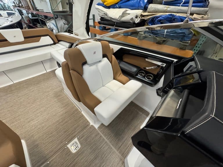 Luxury boat cockpit with comfortable seating and modern controls.